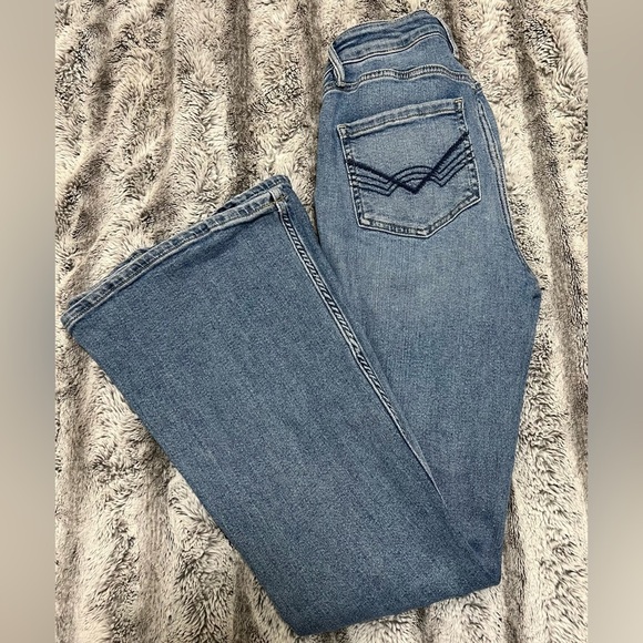 Women's Light Blue Distressed Flare Jeans - Picture 10 of 10